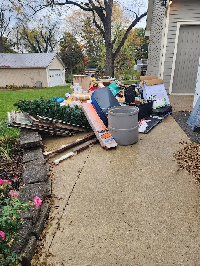 Dumpster being loaded with debris for 3 Yard Dumpster Rental in Tulpehocken